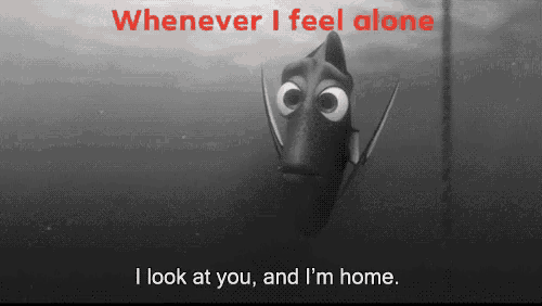 a black and white image of a fish with the words whenever i feel alone i look at you and i 'm home