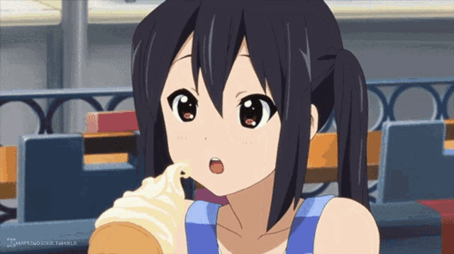 a girl in a blue tank top is eating a sandwich with a watermark that says ' maplewoodzone tumblr '