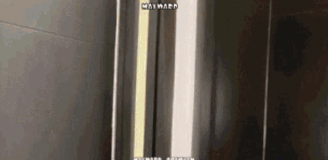 a stainless steel refrigerator door with the word harvard on it