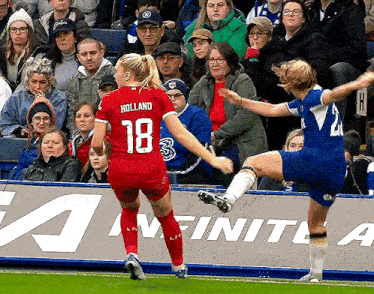 a female soccer player with the number 18 on her shirt