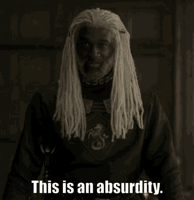 a man with dreadlocks and a black shirt says " this is an absurdity "