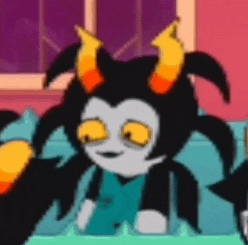 a cartoon character with horns is sitting on a couch and looking at the camera .