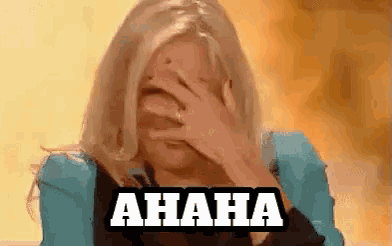 a woman is covering her face with her hands and the word ahaha is on the bottom