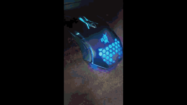 a close up of a computer mouse with the word rat on it