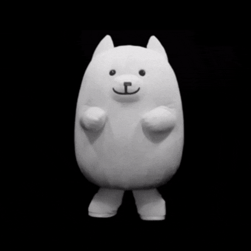 a stuffed animal that looks like a dog with the letter p on it