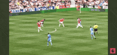 a soccer game is being played in front of a banner that says rainhams fell