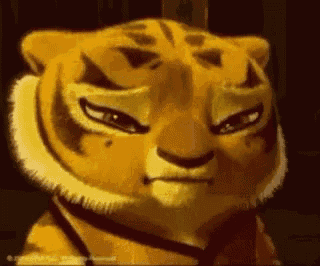 a close up of a cartoon tiger 's face with a serious look on its face .