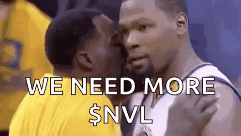 a basketball player is kissing another player on the cheek while another player says `` we need more $ nvl '' .