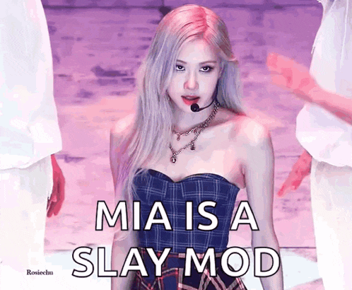mia is a slay mod written on a picture of a woman in a plaid dress