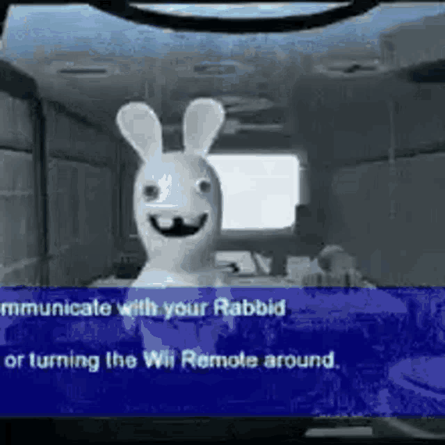 a rabbid rabbit is talking to a person in a video game while holding a wii remote .