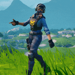 a person wearing a mask and headphones is standing in a grassy field