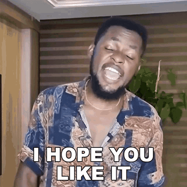 a man with a beard is making a funny face and saying " i hope you like it "