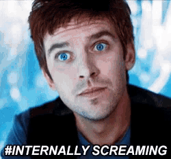 a man with blue eyes is screaming with the words internally screaming next to him