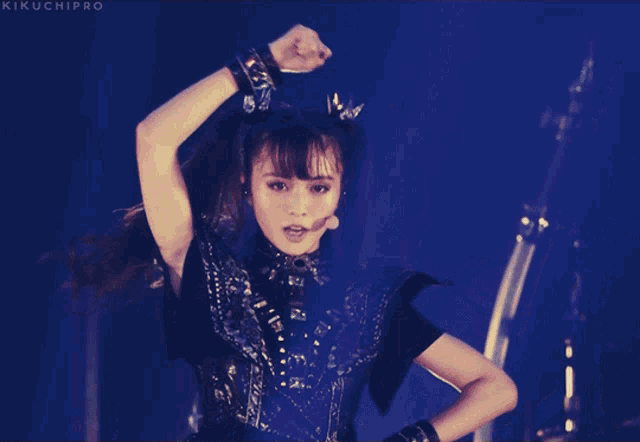 a photo of a girl with the words kikuchipro on the bottom right