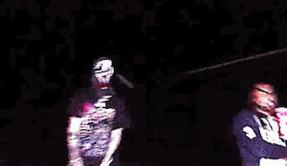a blurry picture of a man and a woman dancing