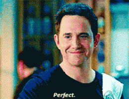 a pixelated image of a man with the word perfect written on his shirt