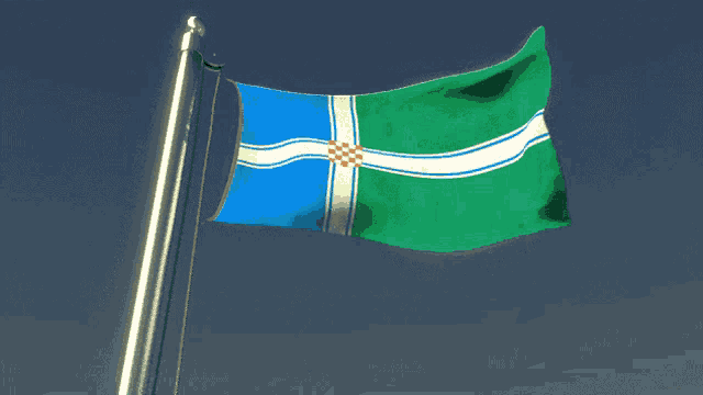 a green white and blue flag with a checkered pattern