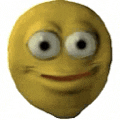 a yellow smiley face with big eyes and a smile on it .