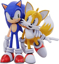 sonic and tails from the video game sonic the hedgehog are standing next to each other