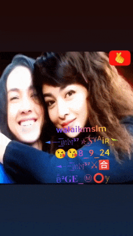 a man and a woman are posing for a picture with a thumbs up on the bottom