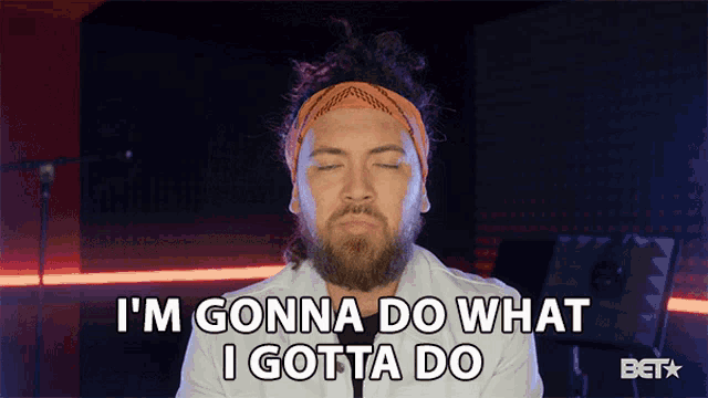 a man with a beard and headband says i 'm gonna do what i gotta do