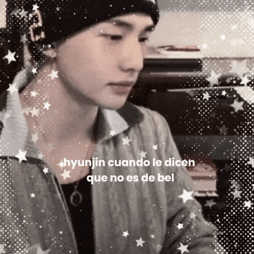 a picture of a man with the words hyunjin cuando le dicen que no es de bel below him