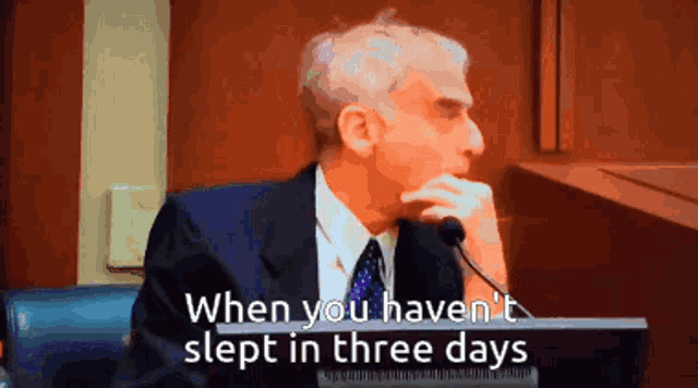 a man in a suit and tie speaking into a microphone with the words when you haven 't slept in three days