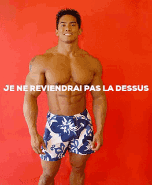 a muscular man stands in front of a red background with the words je ne reviendrai pas la dessus written above him