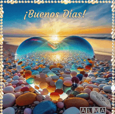 a heart made out of rocks on a beach with the words buenos dias