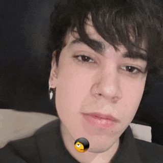 a close up of a person 's face with a smiley face on it