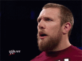a man in a wrestling ring with a woman in a red shirt that says you got you