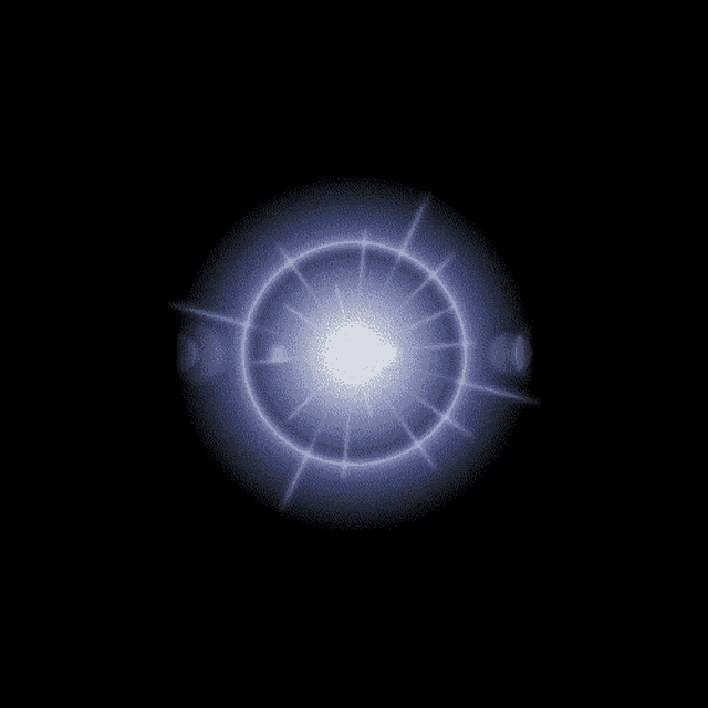 a blue circle with rays coming out of it in the dark