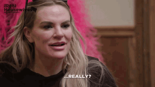 a woman says " really " while wearing a cat costume