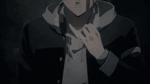 a person with blood on their face is holding their head