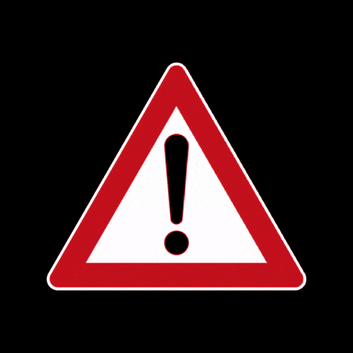 a red and white triangle with an exclamation point inside of it