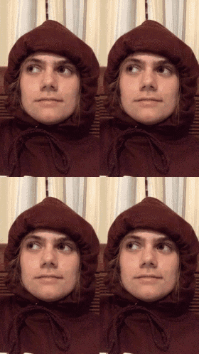 a woman wearing a maroon hoodie with a hood on her head