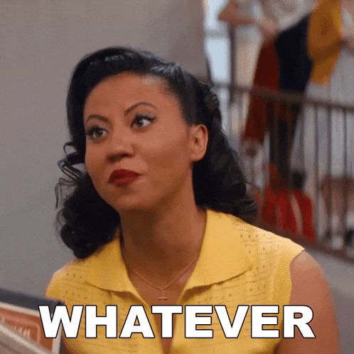a woman wearing a yellow shirt says whatever