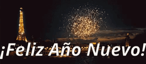 a fireworks display with the words feliz ano nuevo in white letters