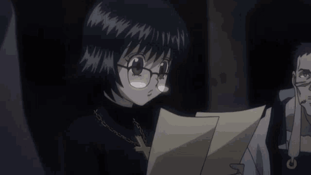 a girl holding a book with the words i 'm going to die next week