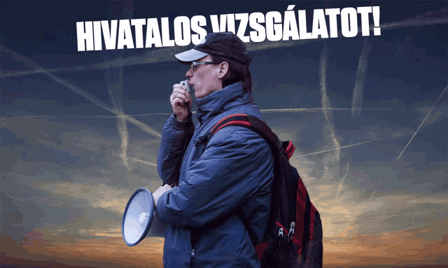 a man holding a megaphone in front of a sign that says hivatalos vizsgatatot