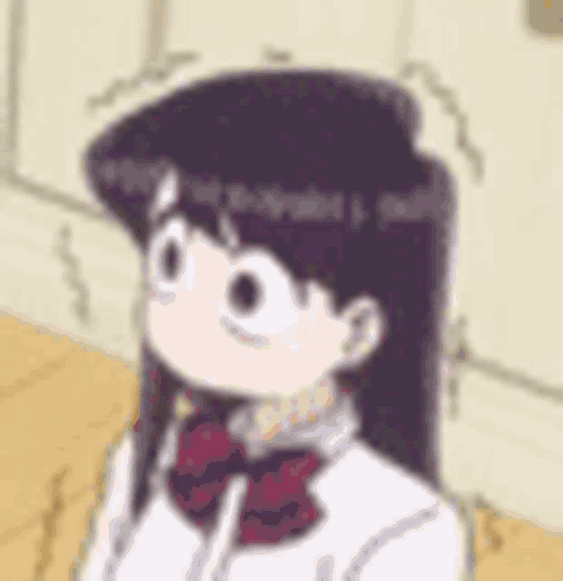 a cartoon girl with long black hair and a bow tie is sitting on a wooden floor .