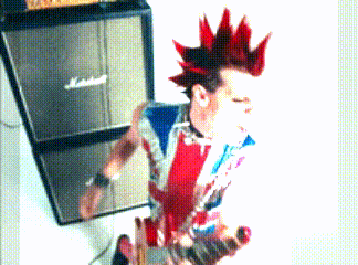 a man in a red mohawk is standing in front of a marshall amplifier