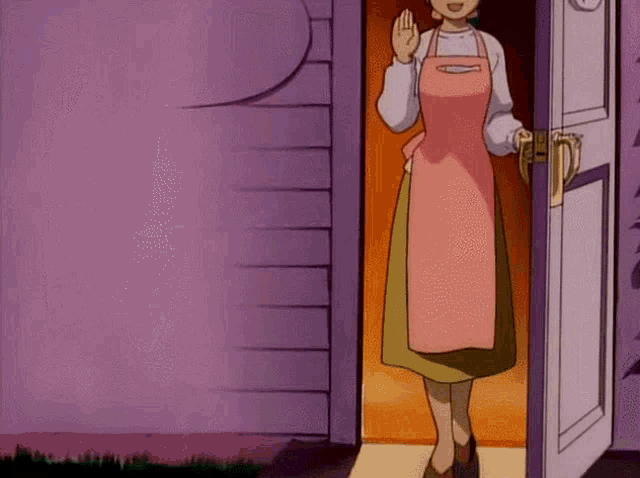 a woman wearing a pink apron is standing in a doorway