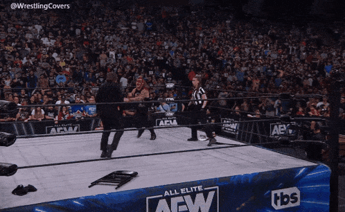 a wrestling ring that says aew on it