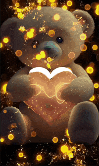 a teddy bear is holding a lighted heart in its hands