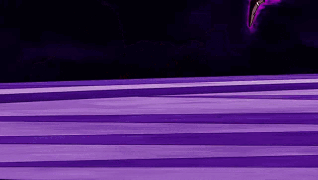 a person is standing on a purple surface with a purple light coming out of it .