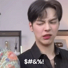 a man in a black shirt is making a funny face with the words $ # ! & % ! written on the bottom
