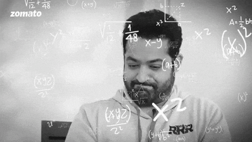 a man is surrounded by mathematical equations and the word zomato is on the bottom right