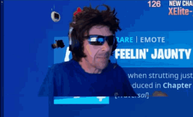 a man wearing sunglasses and headphones says feelin jaunty on a screen