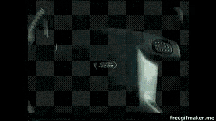 a black and white photo of a car with a sign on the windshield that says " freegifmaker.me "